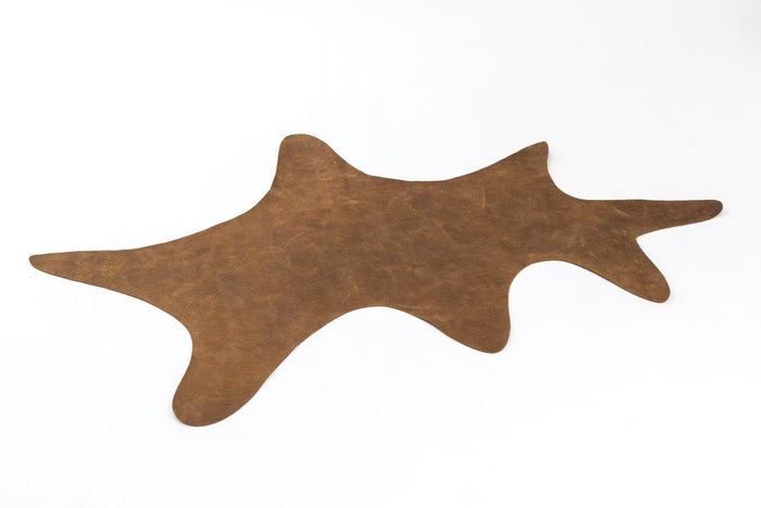 Baie Cowhide Rug for Dune - The Meow Picks