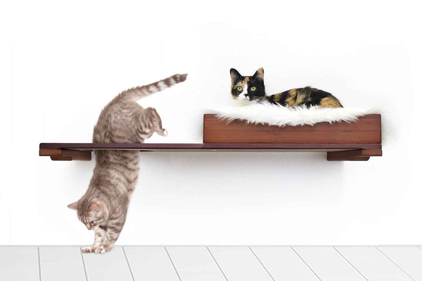 Wall-mounted bamboo cat bed with a curved front ledge and faux fur pad