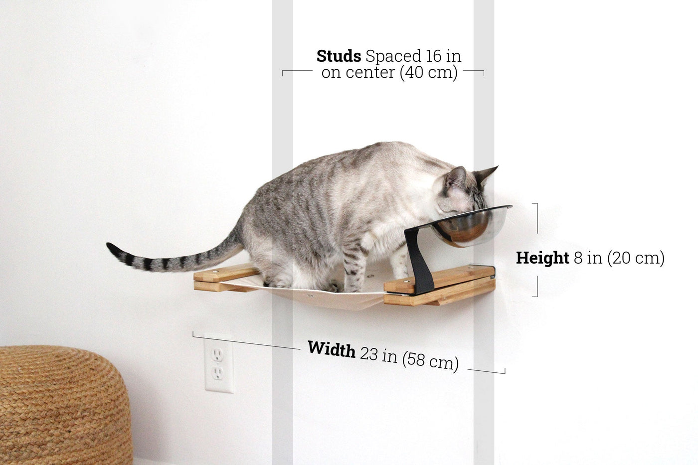 Wall mounted raised cat feeder with food dishes and an attached canvas lounge