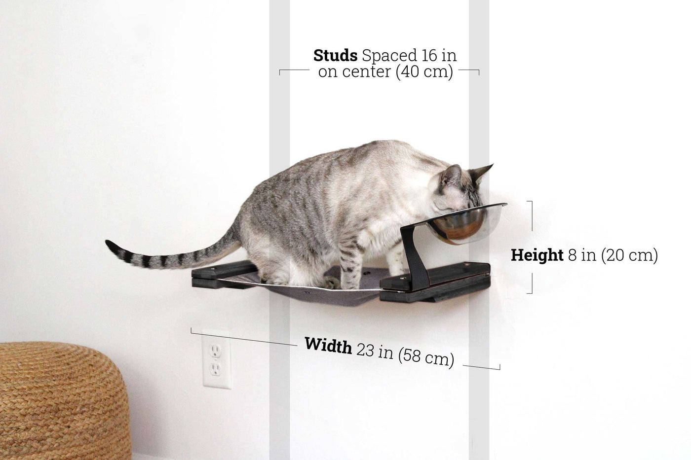 Wall mounted raised cat feeder with food dishes and an attached canvas lounge