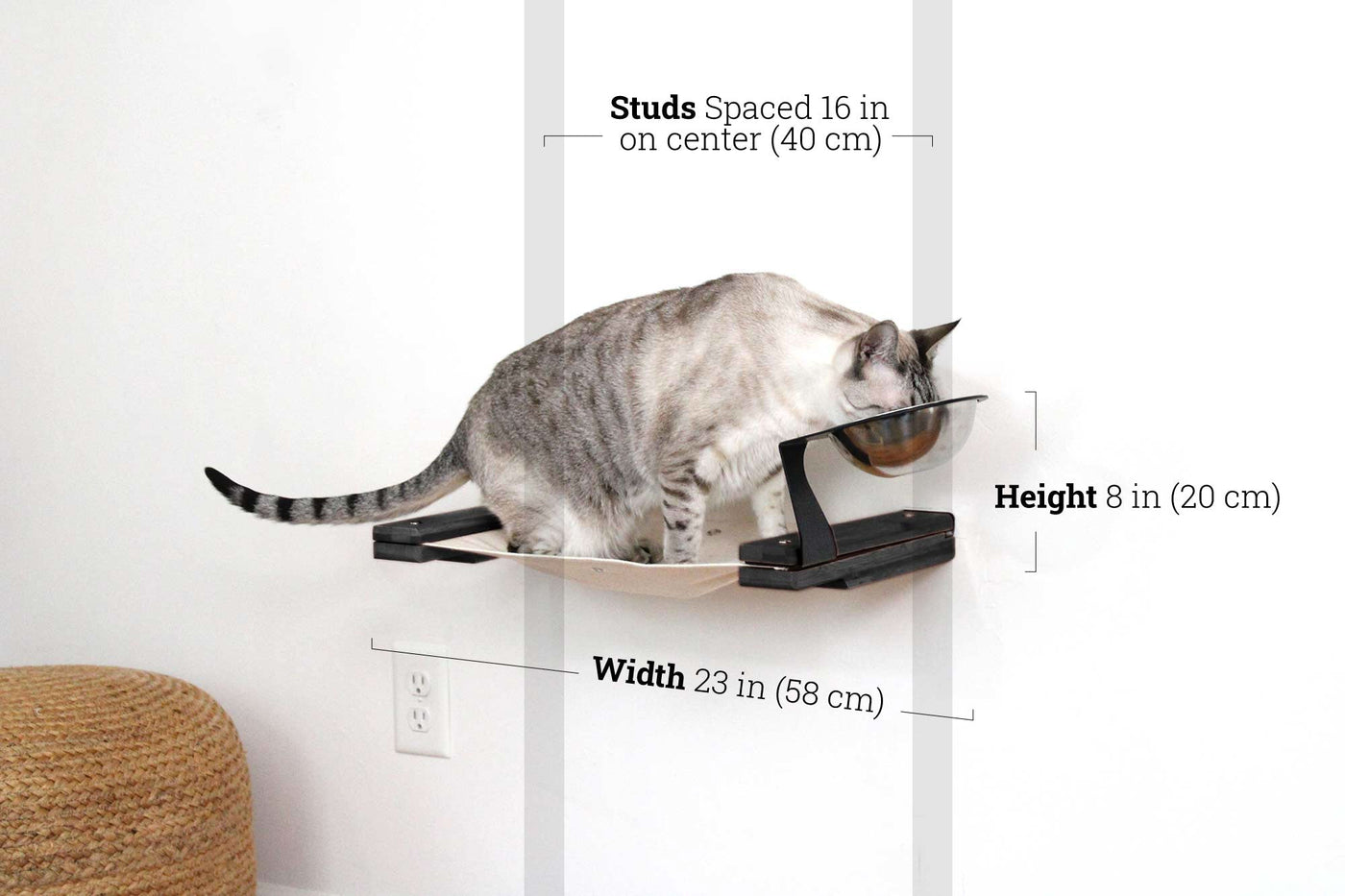 Wall mounted raised cat feeder with food dishes and an attached canvas lounge