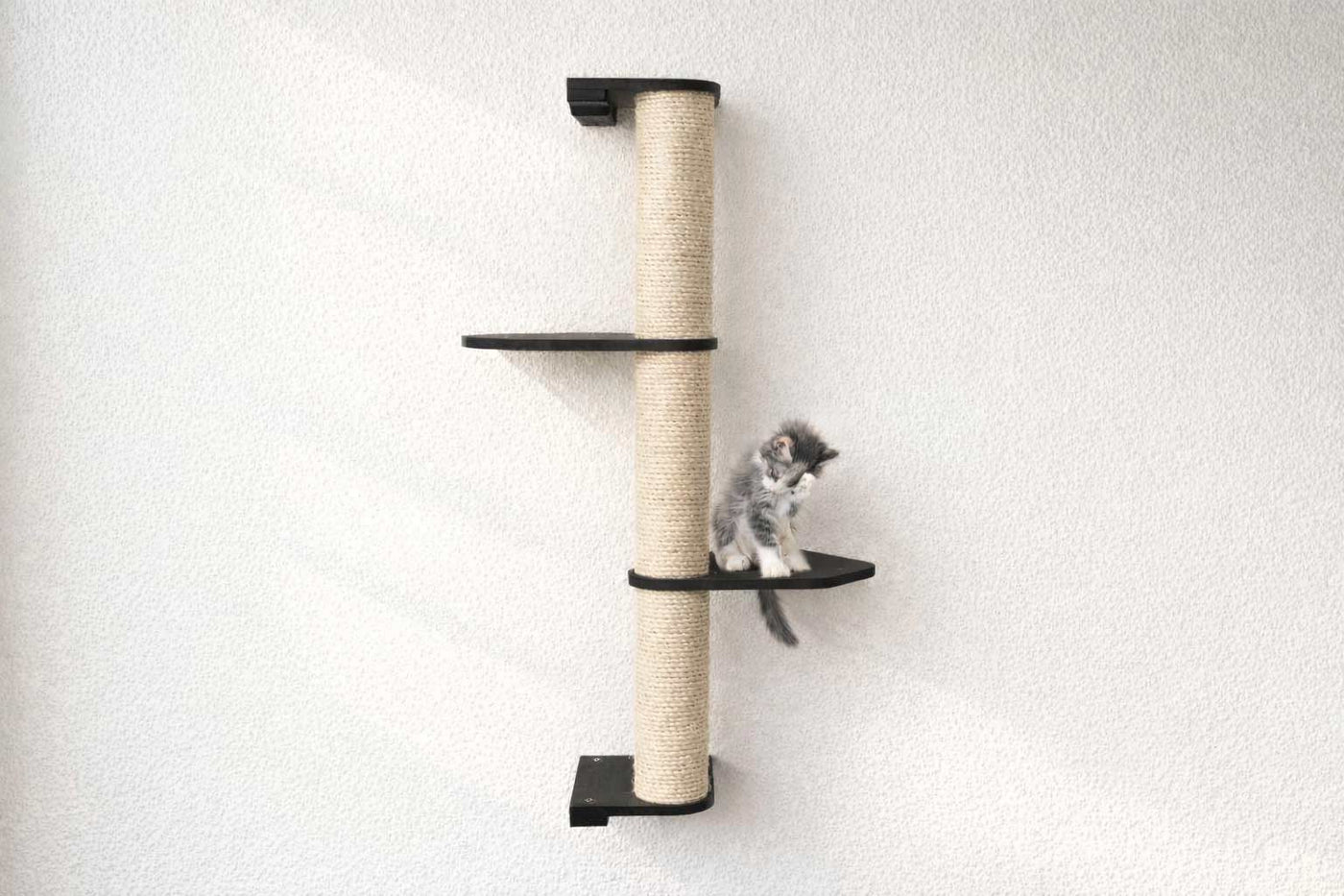 Wall mounted sisal cat scratching pole with a leaf shelf attached partway up