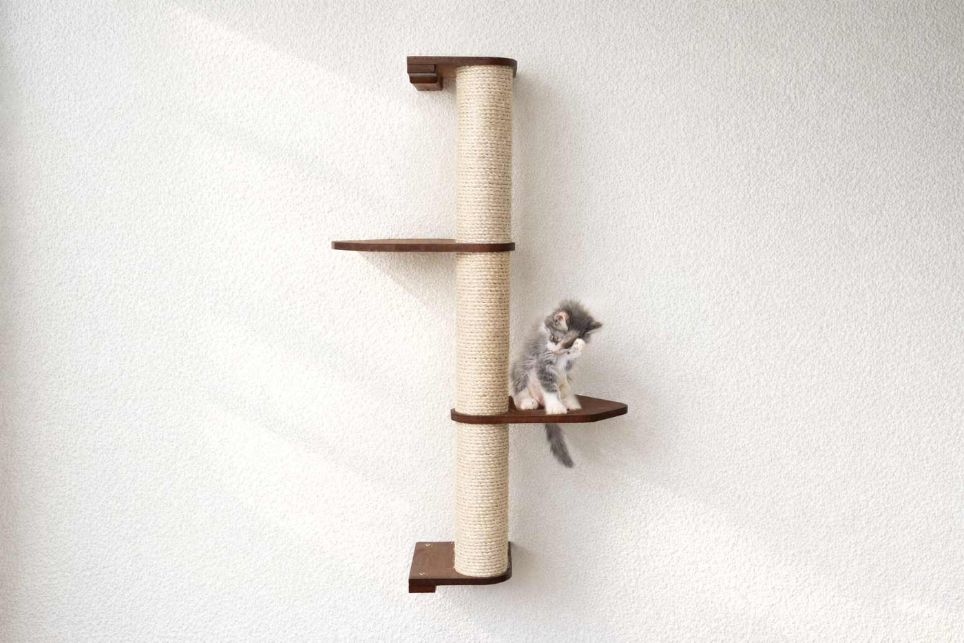 Wall mounted sisal cat scratching pole with a leaf shelf attached partway up