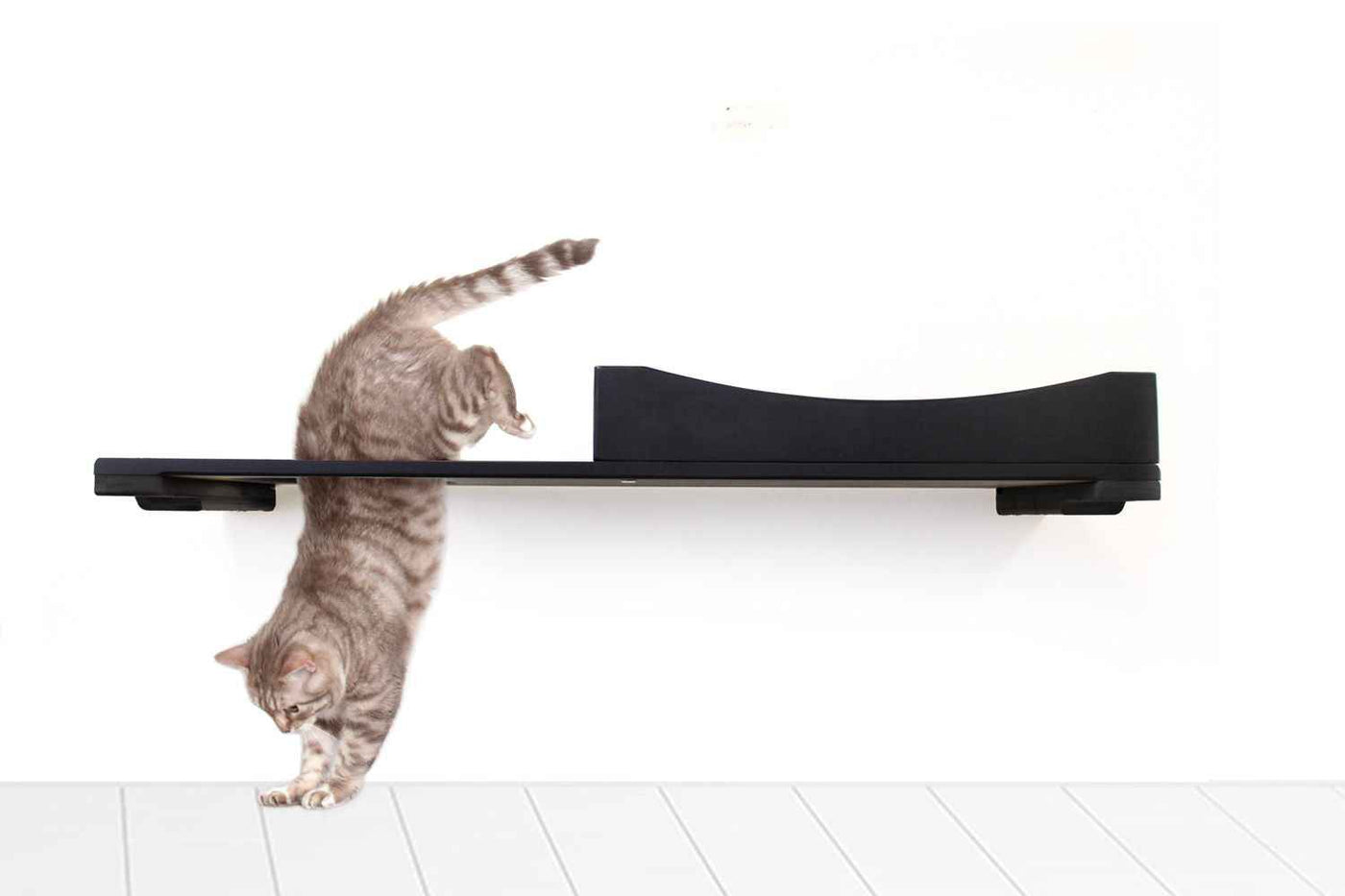 Wall-mounted bamboo cat bed with a curved front ledge and faux fur pad