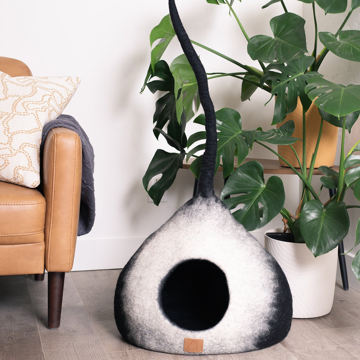 Burst Cat Cave, Tail, a felted wool cat cave bed by Fuzzy Cove