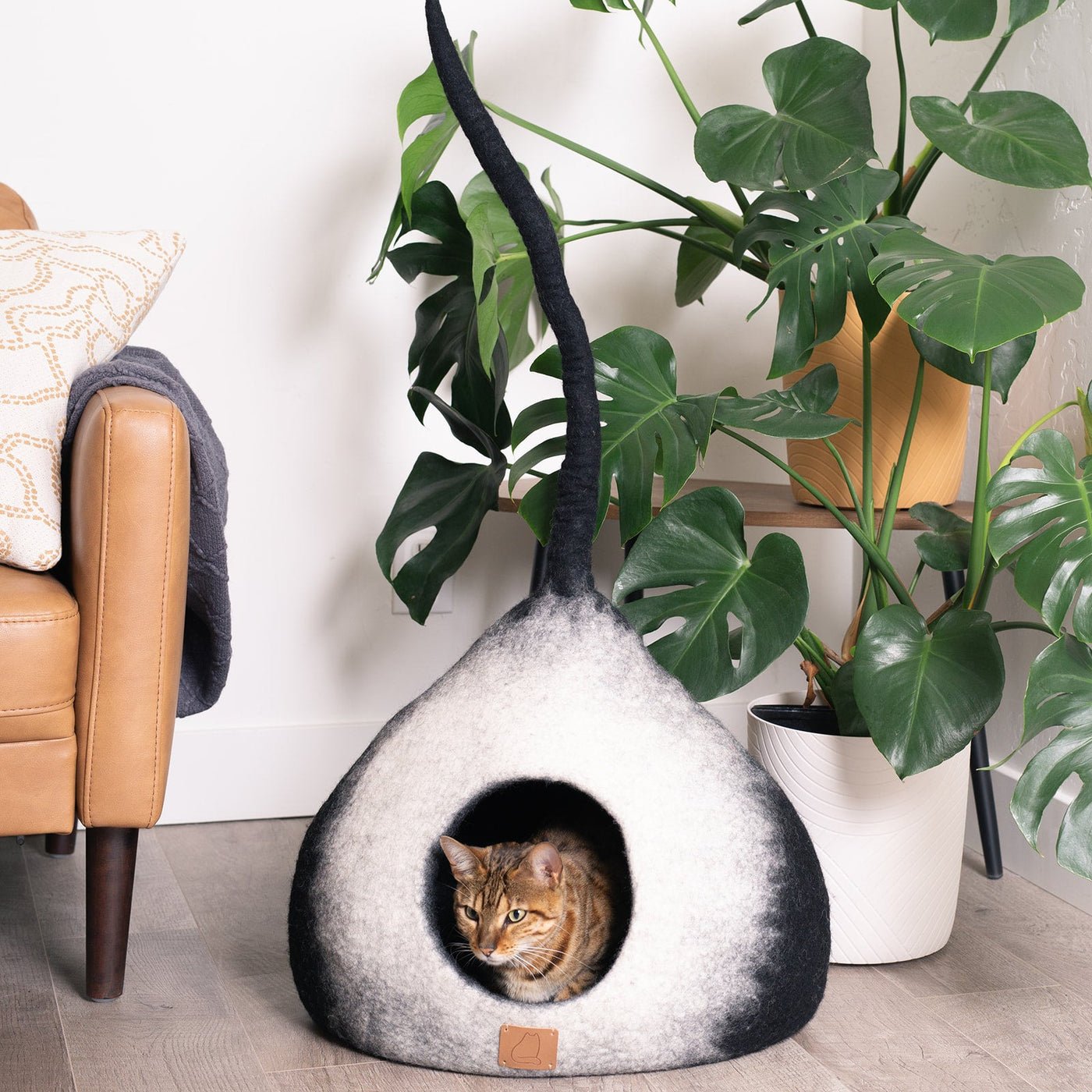Burst Cat Cave, Tail, a felted wool cat cave bed by Fuzzy Cove
