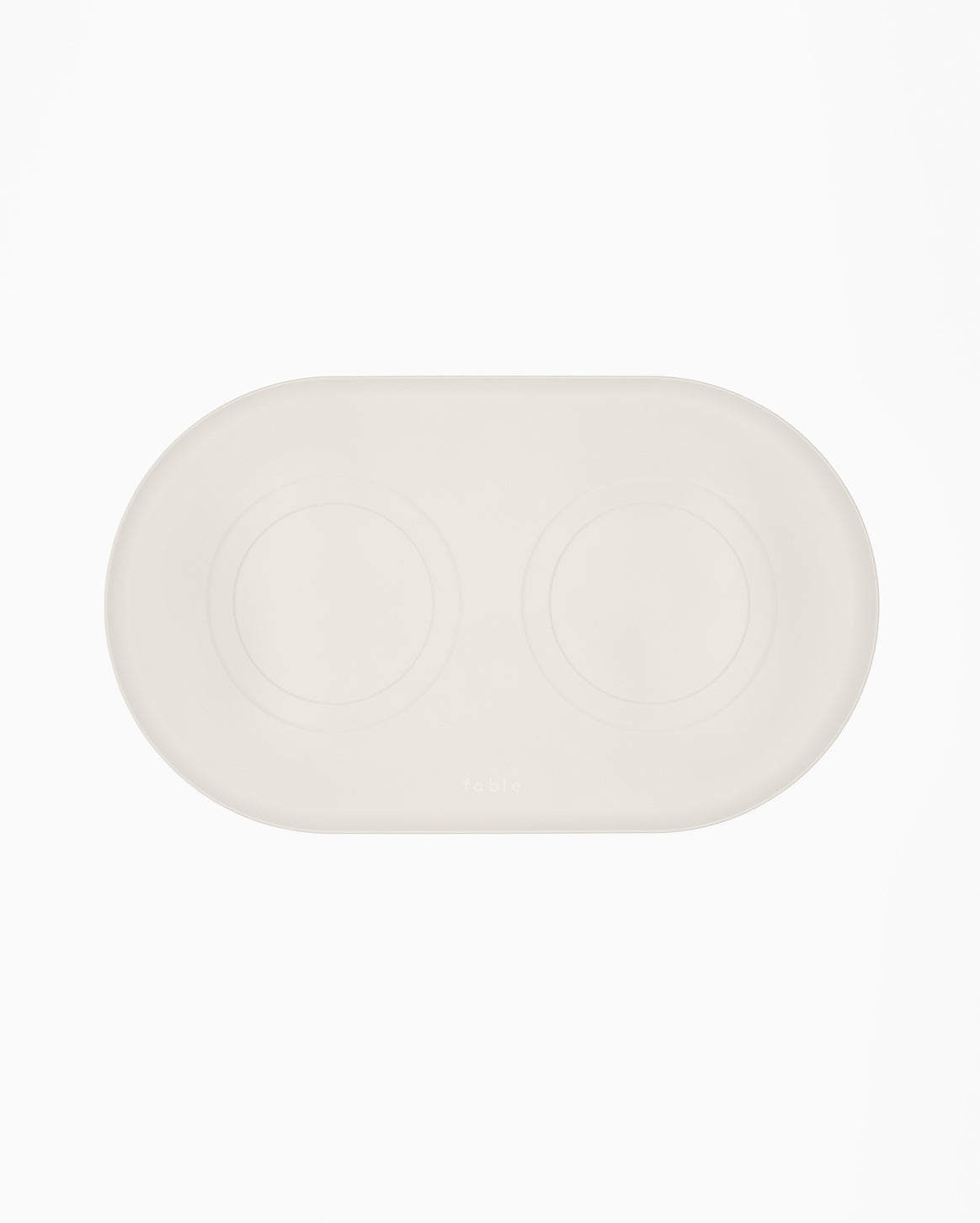 Fable Signature Bowl Mat with a raised border under a cat bowl
