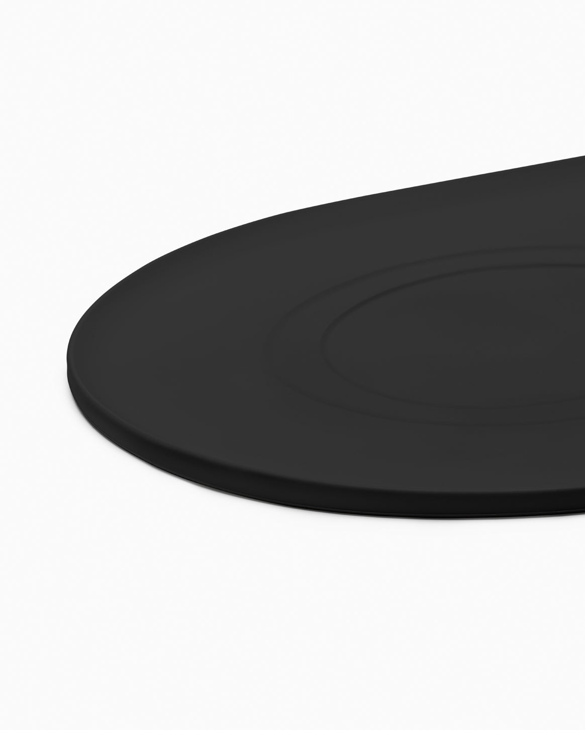 Fable Signature Bowl Mat with a raised border under a cat bowl