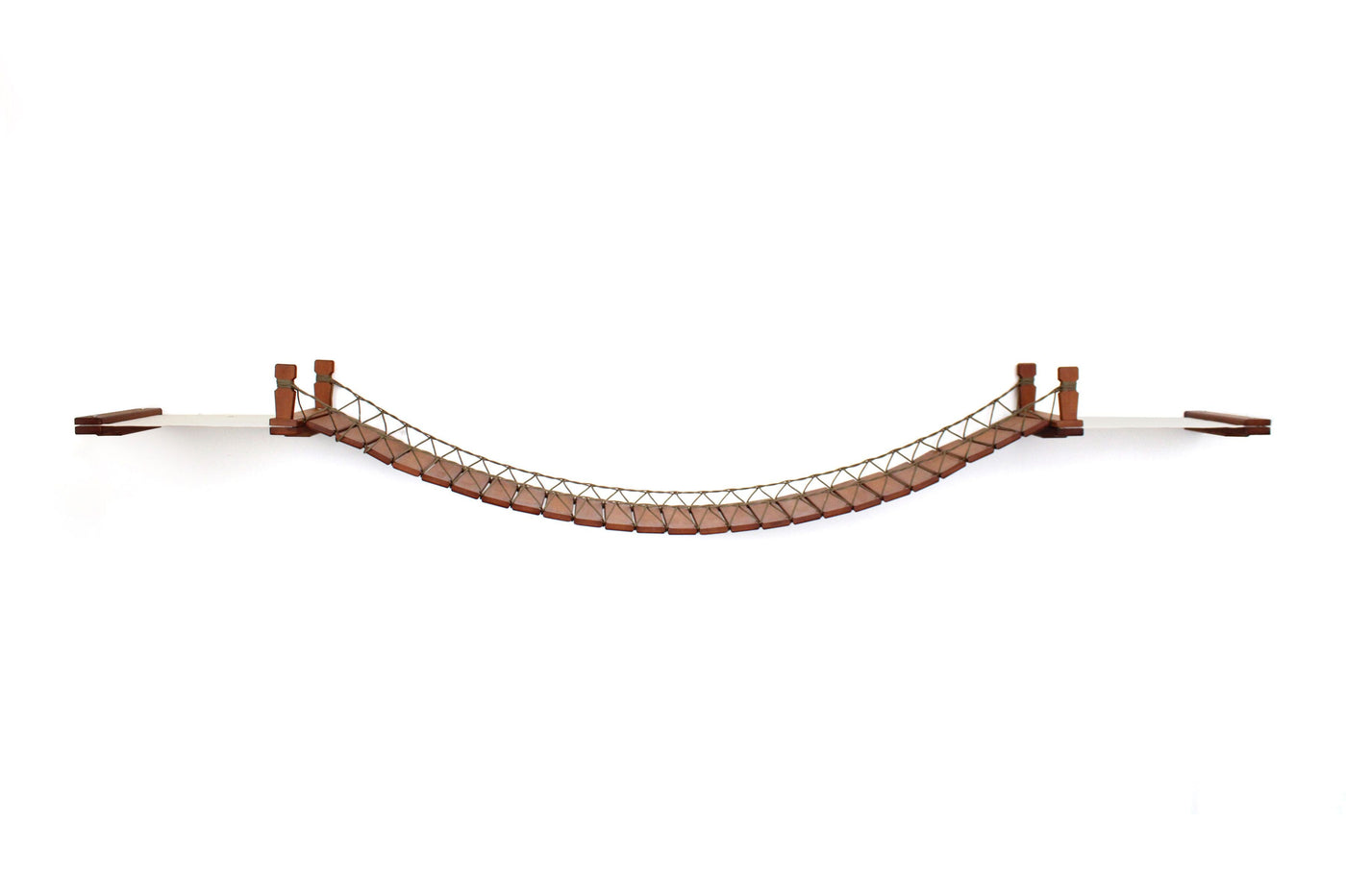 Wall mounted cat bridge with a canvas hammock at each end above a doorway