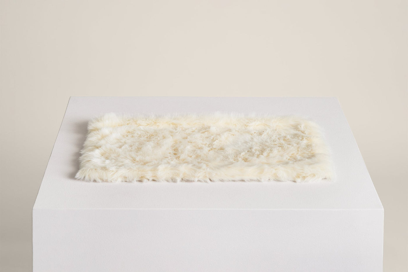 Floof reversible faux-fur cat cushion