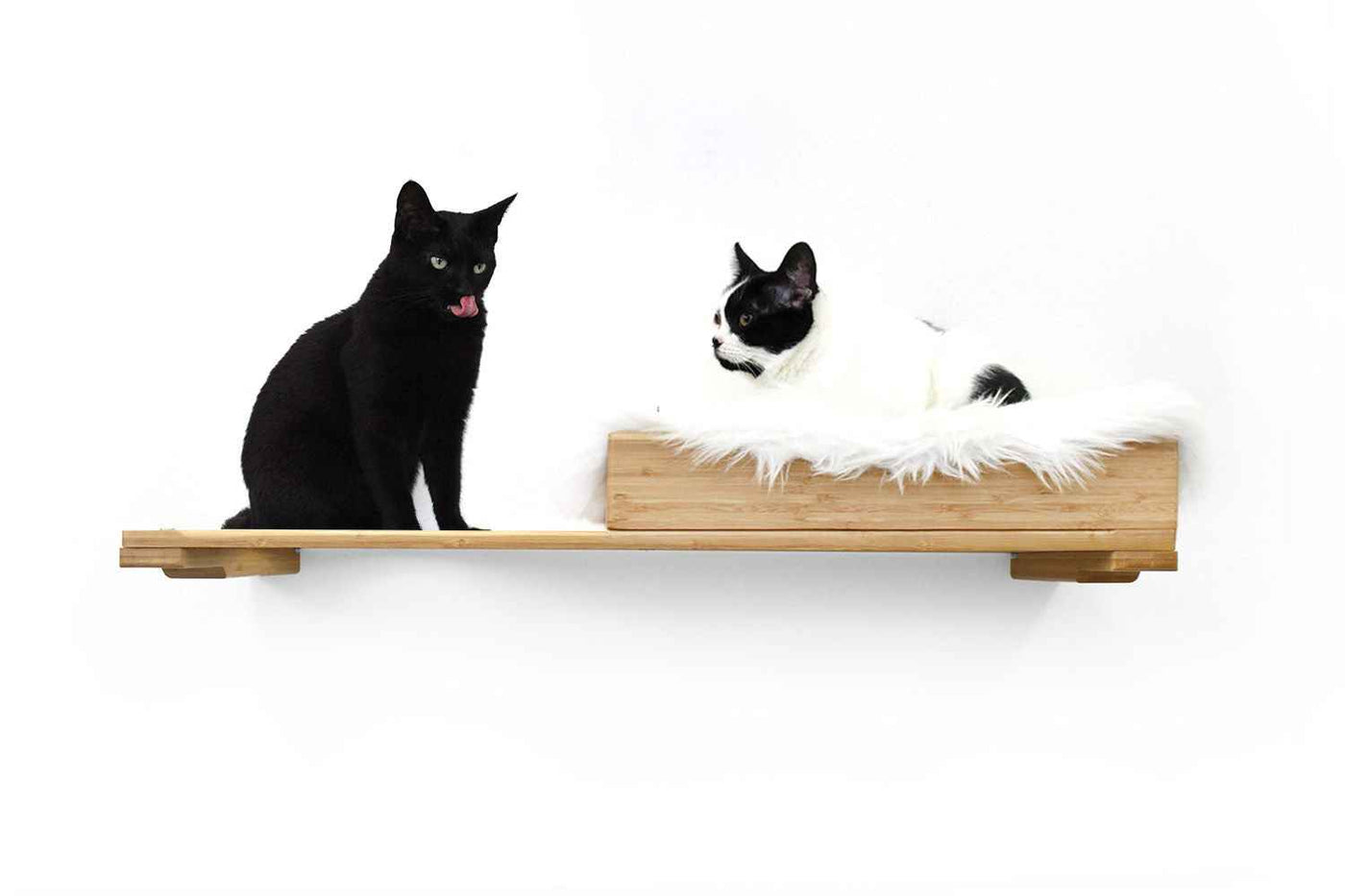 Wall-mounted bamboo cat bed with a curved front ledge and faux fur pad