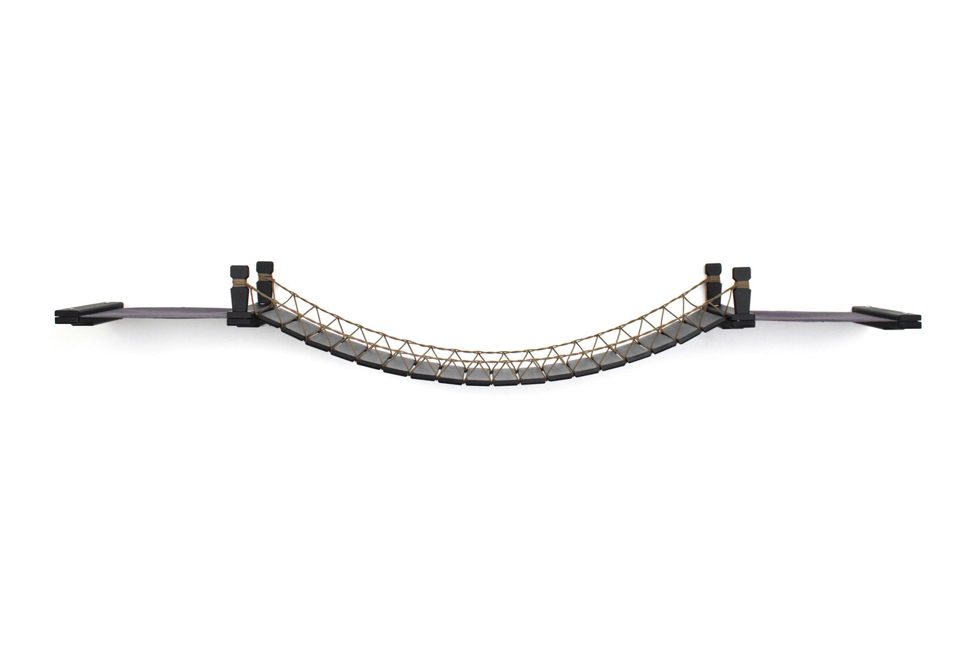 Wall mounted cat bridge with a canvas hammock at each end above a doorway