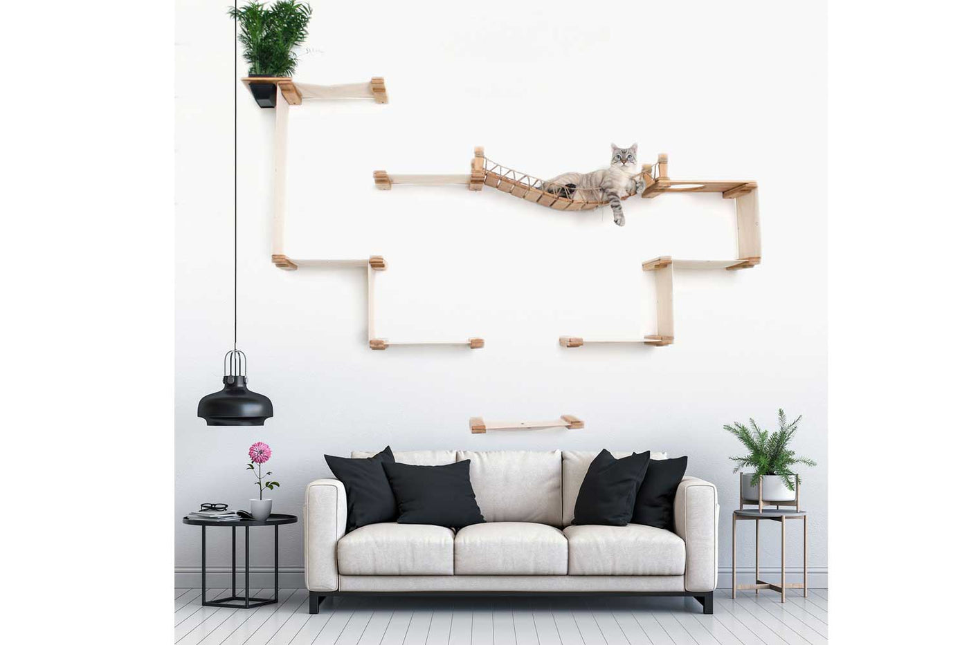 Wall mounted multi-level bamboo cat condo with several canvas hammocks and a central bridge