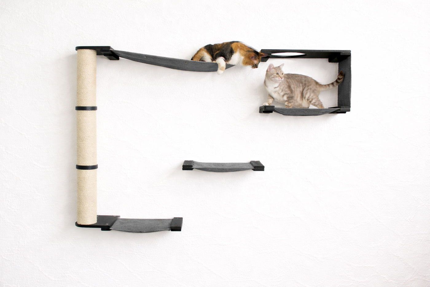 Wall mounted cat condo with a tall three-tier sisal scratching pole and stacked platforms