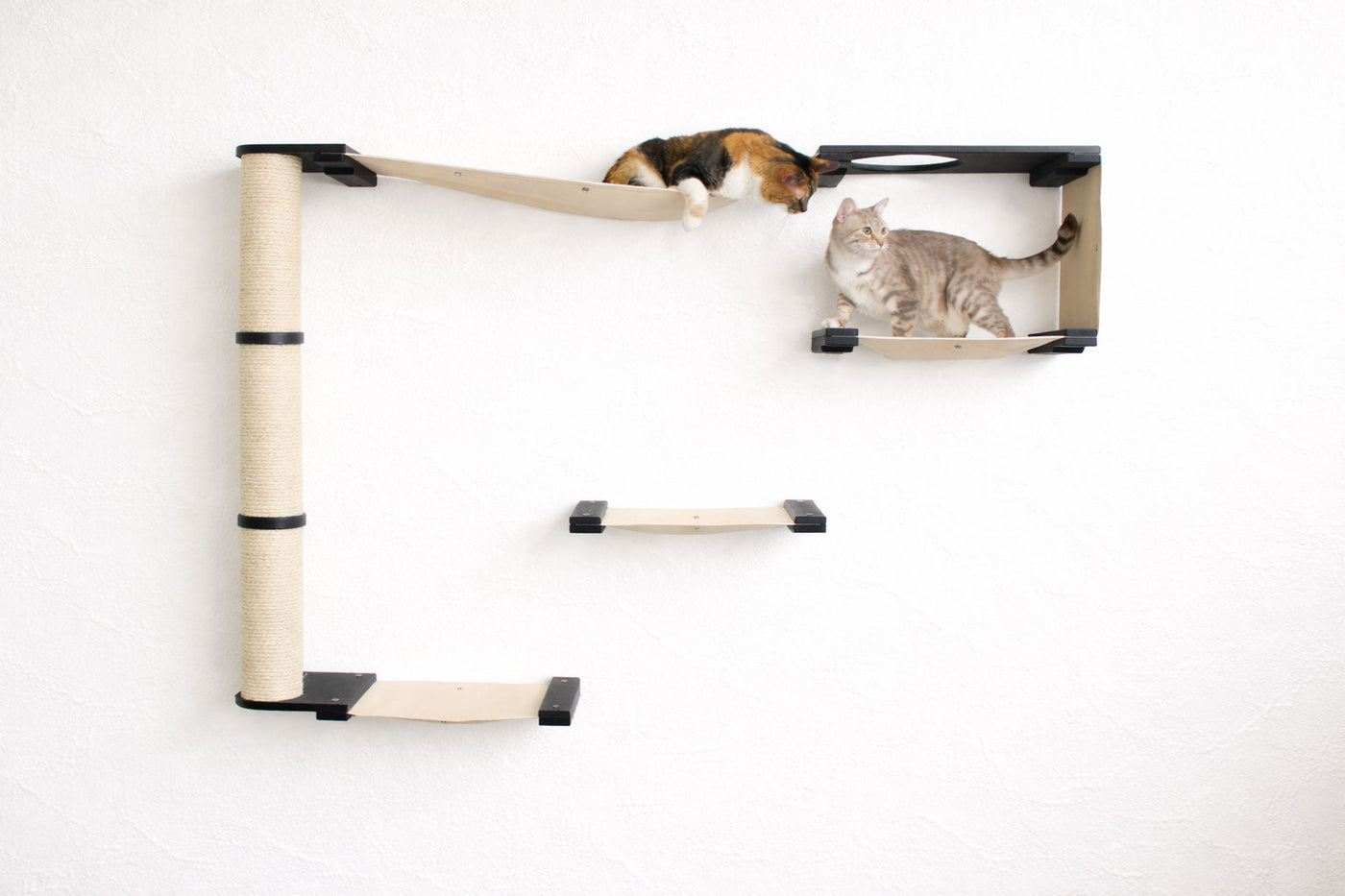 Wall mounted cat condo with a tall three-tier sisal scratching pole and stacked platforms