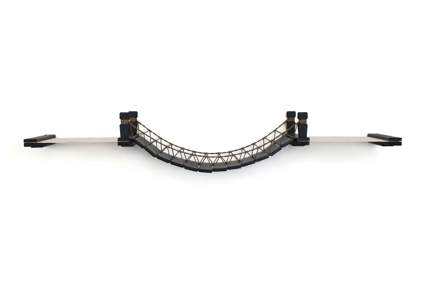 Wall mounted cat bridge with a canvas hammock at each end above a doorway