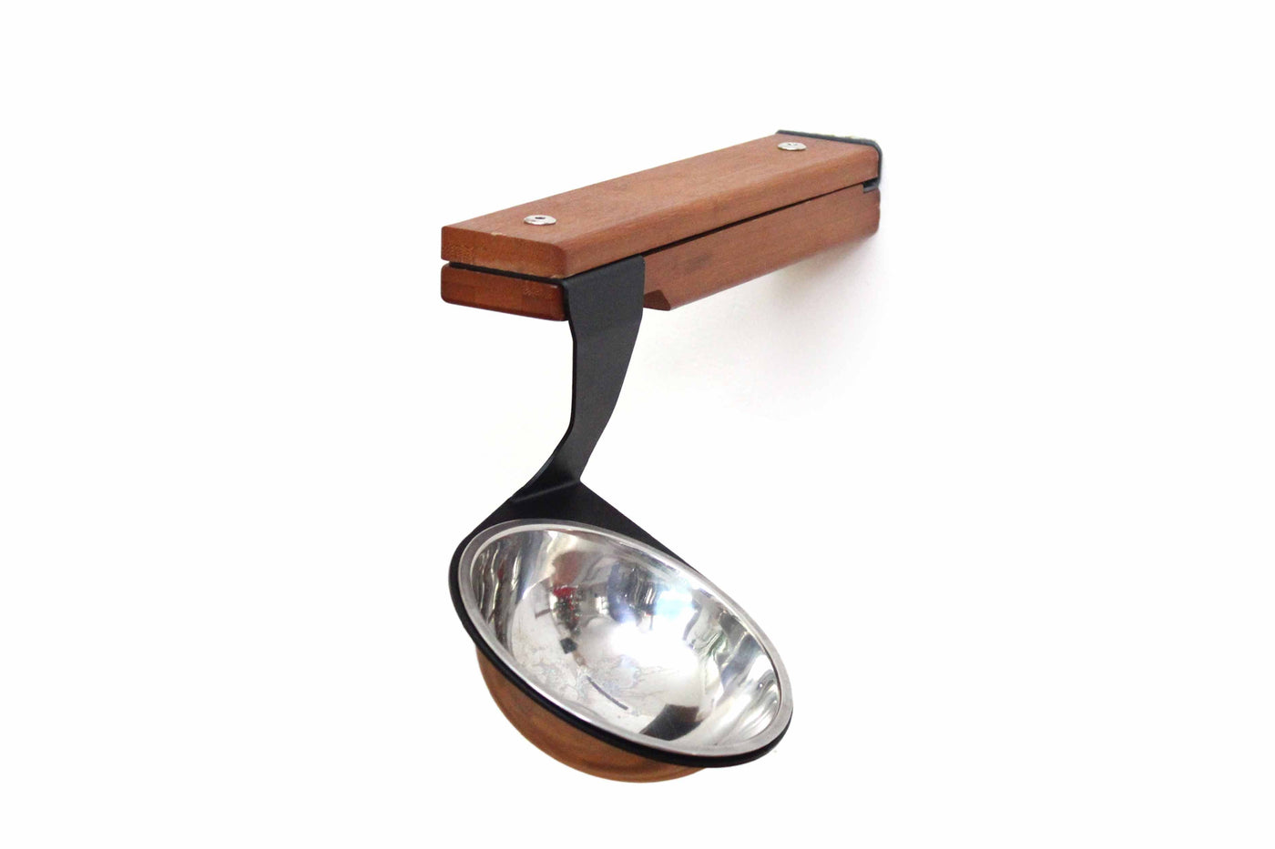 Wall mounted bamboo cat feeding shelf with two food dishes and an escape hatch opening above