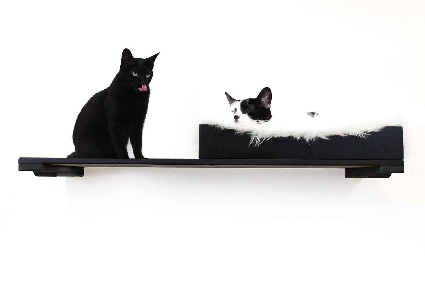 Wall-mounted bamboo cat bed with a curved front ledge and faux fur pad