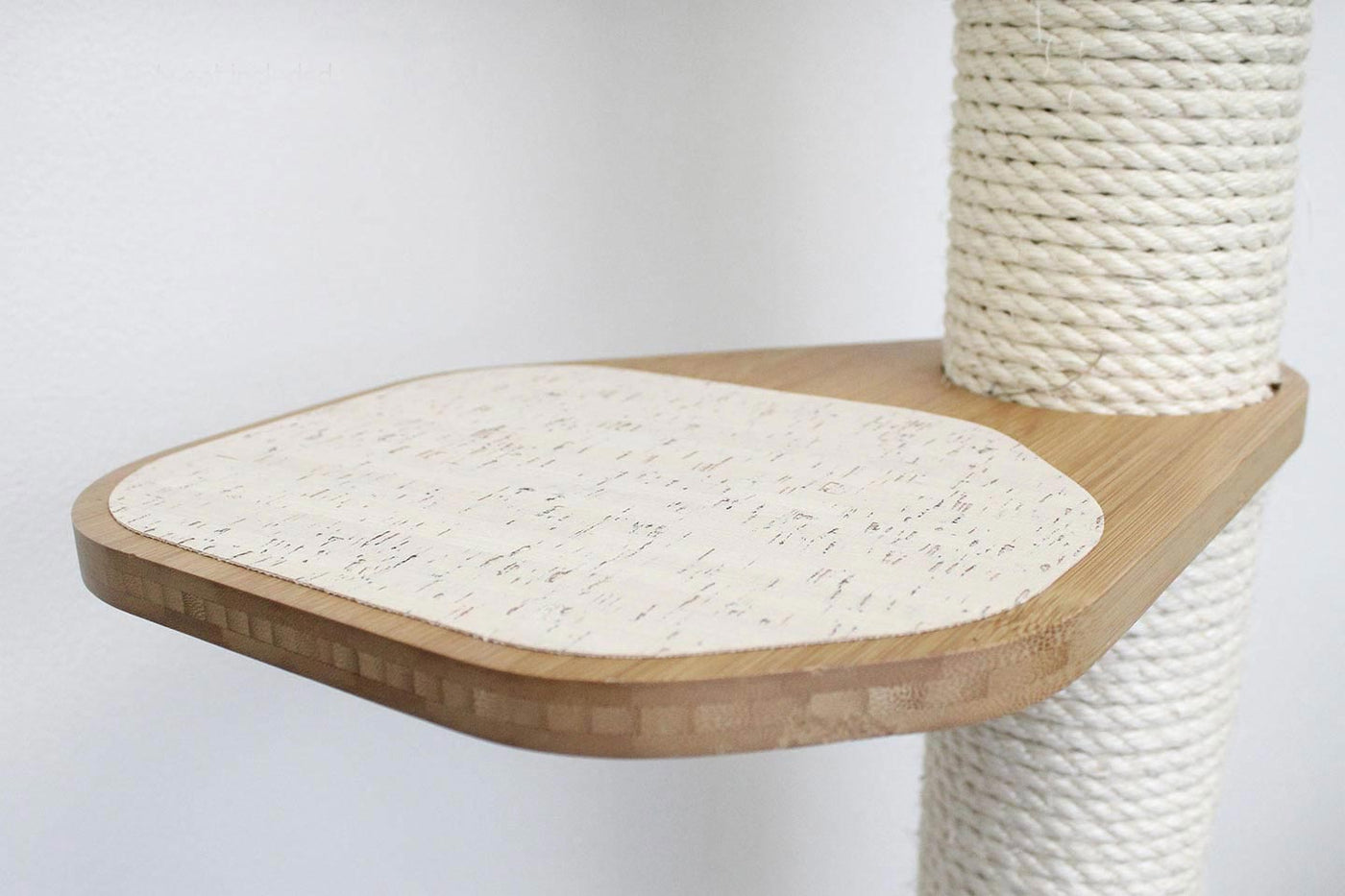 Wall mounted cat condo with a tall three-tier sisal scratching pole and stacked platforms