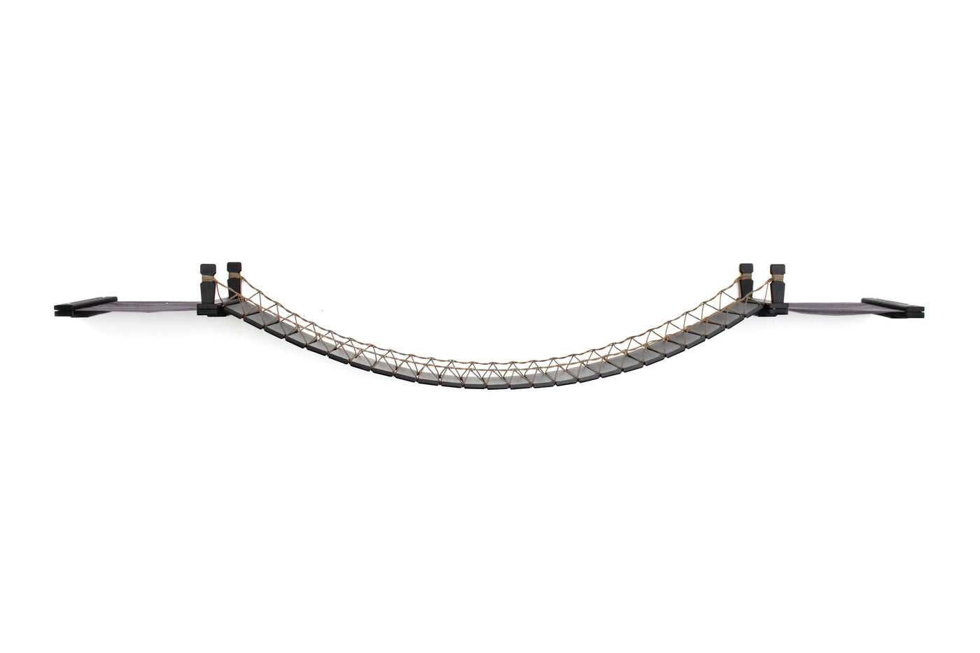 Wall mounted cat bridge with a canvas hammock at each end above a doorway
