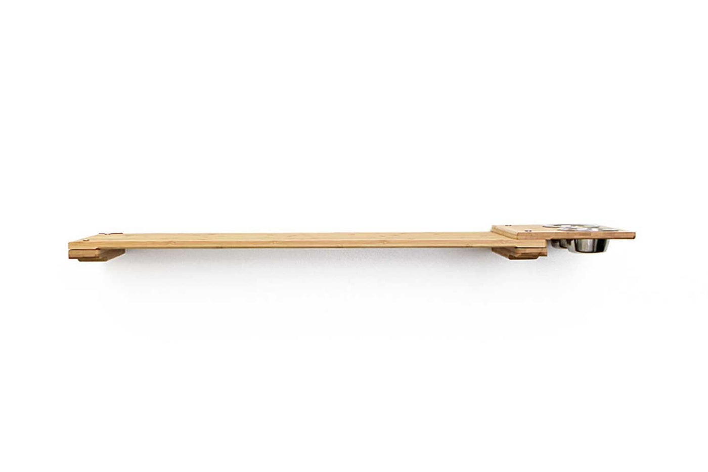 Wall mounted bamboo cat feeding shelf with two food dishes and an escape hatch opening above